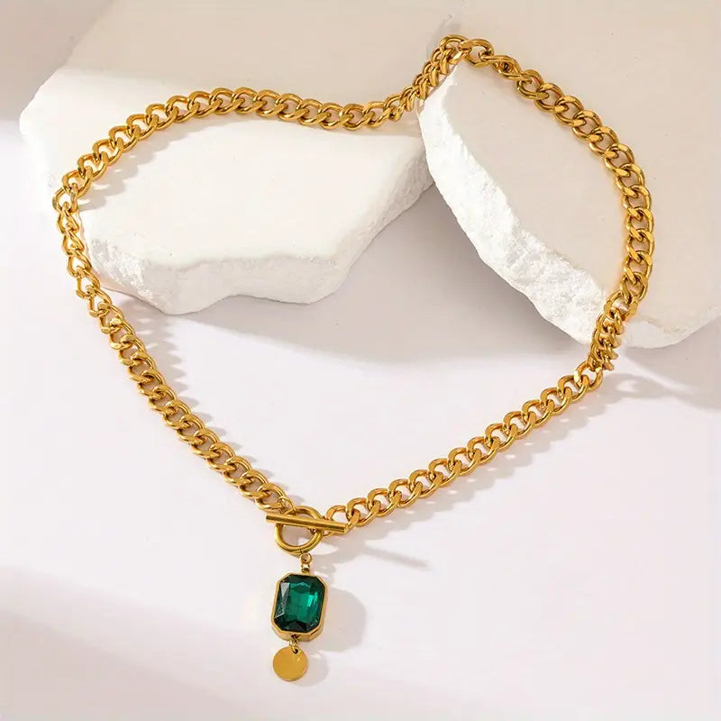 Halsband med smaragdguldhänge