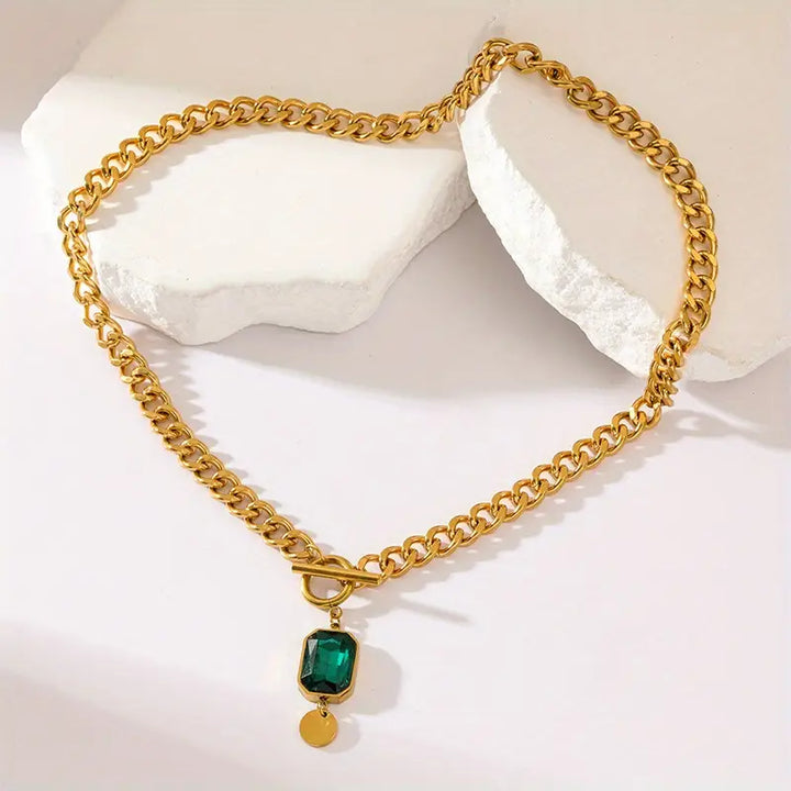 Halsband med smaragdguldhänge