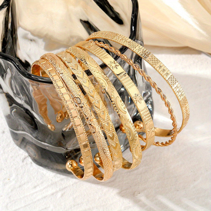 Set med guldfärgade boho-armband