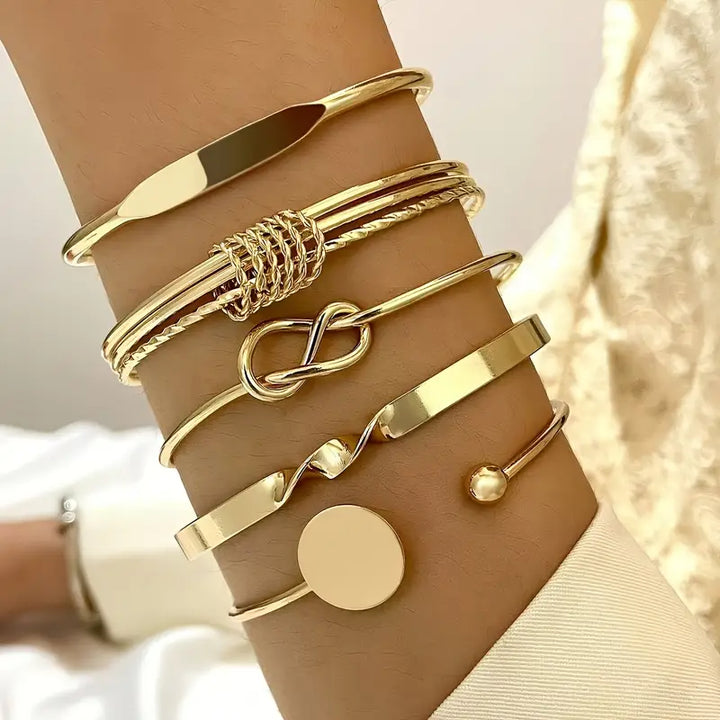 Elegant set med guldarmband