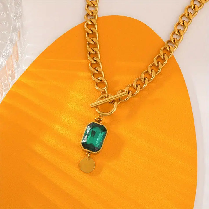 Halsband med smaragdguldhänge
