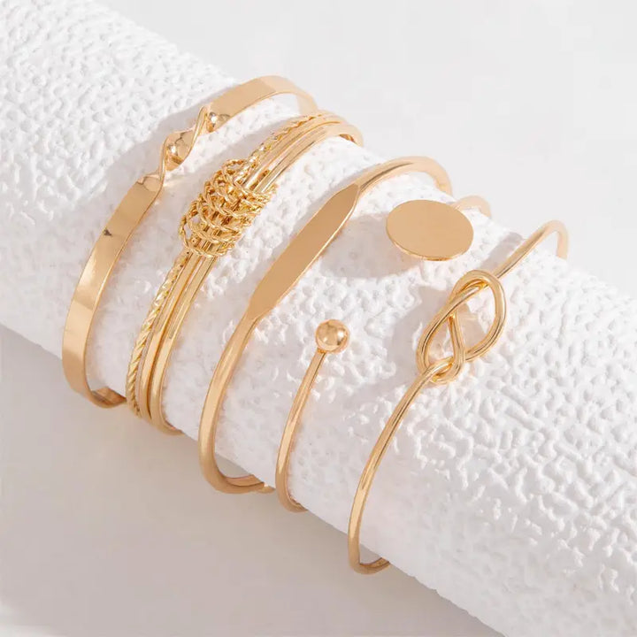 Elegant set med guldarmband
