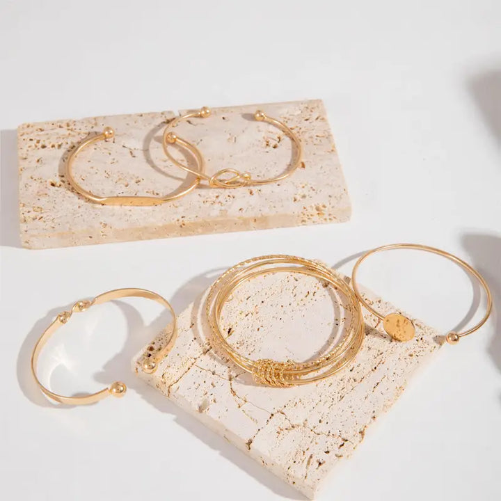 Elegant set med guldarmband