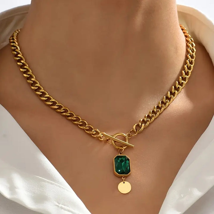 Halsband med smaragdguldhänge