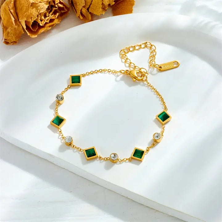 Armband med gyllene ädelstenar