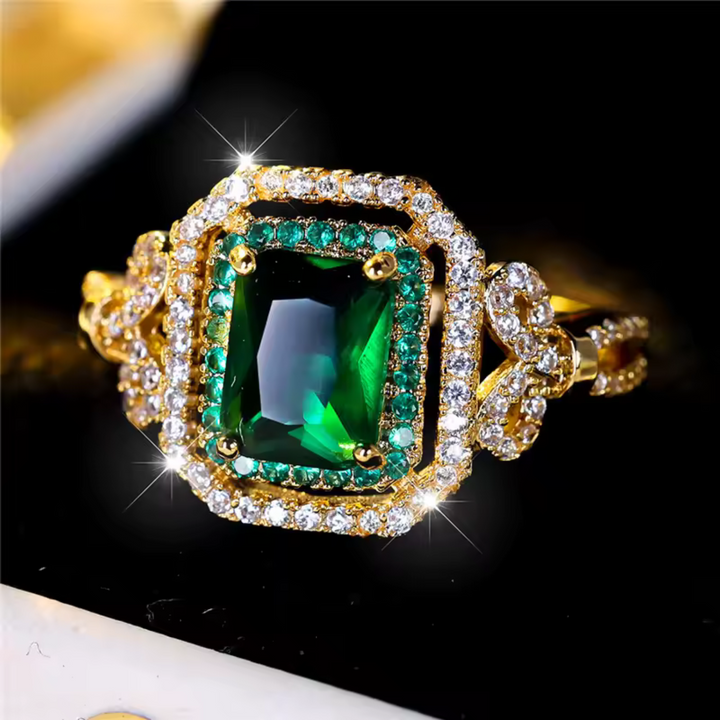 Elegant ring med smaragdsten i guld