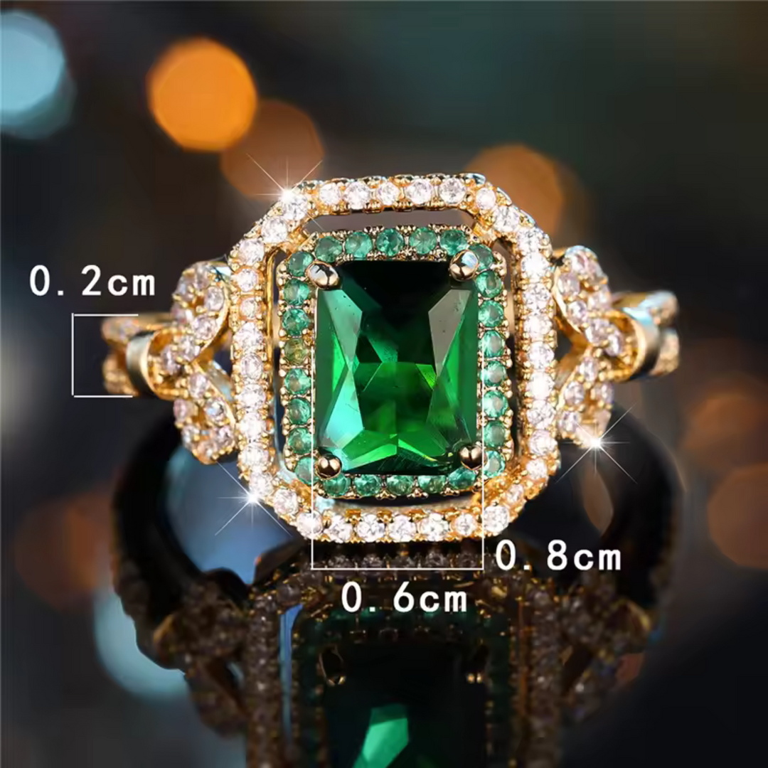 Elegant ring med smaragdsten i guld