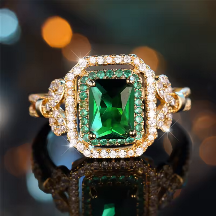 Elegant ring med smaragdsten i guld