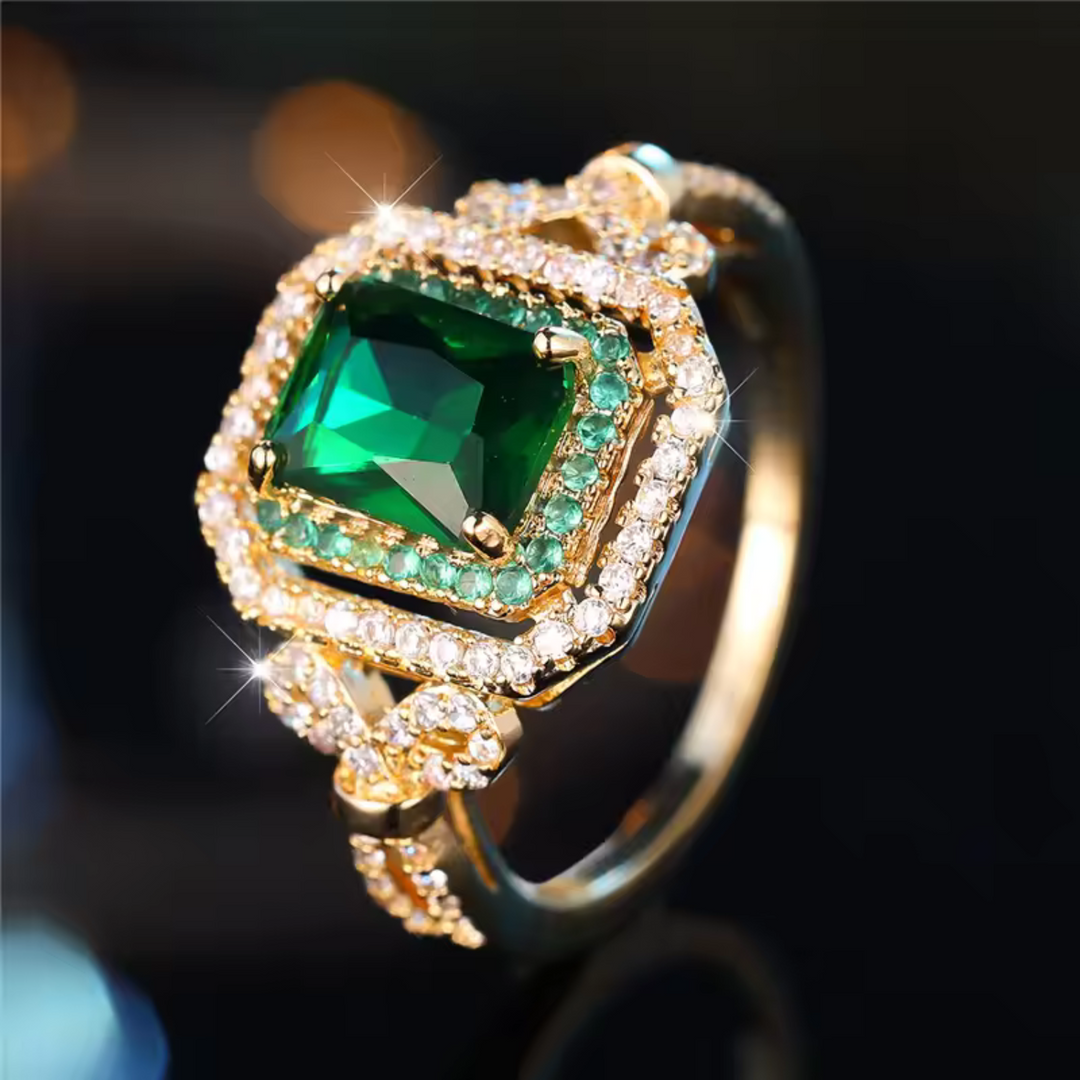 Elegant ring med smaragdsten i guld