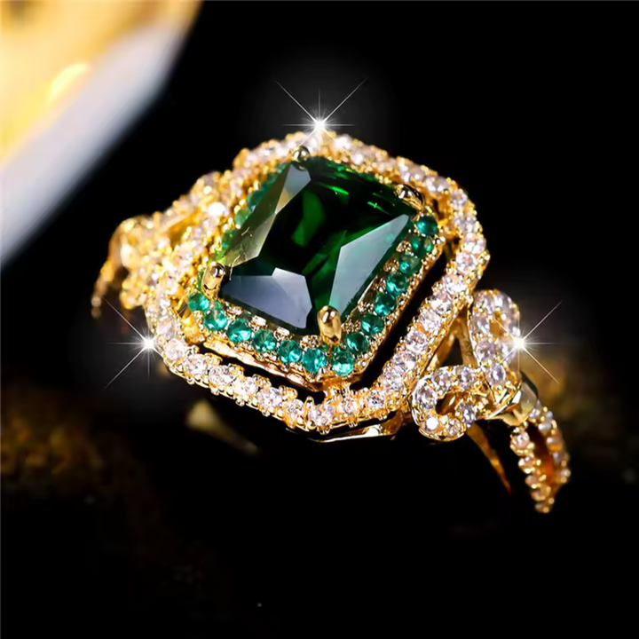Elegant ring med smaragdsten i guld