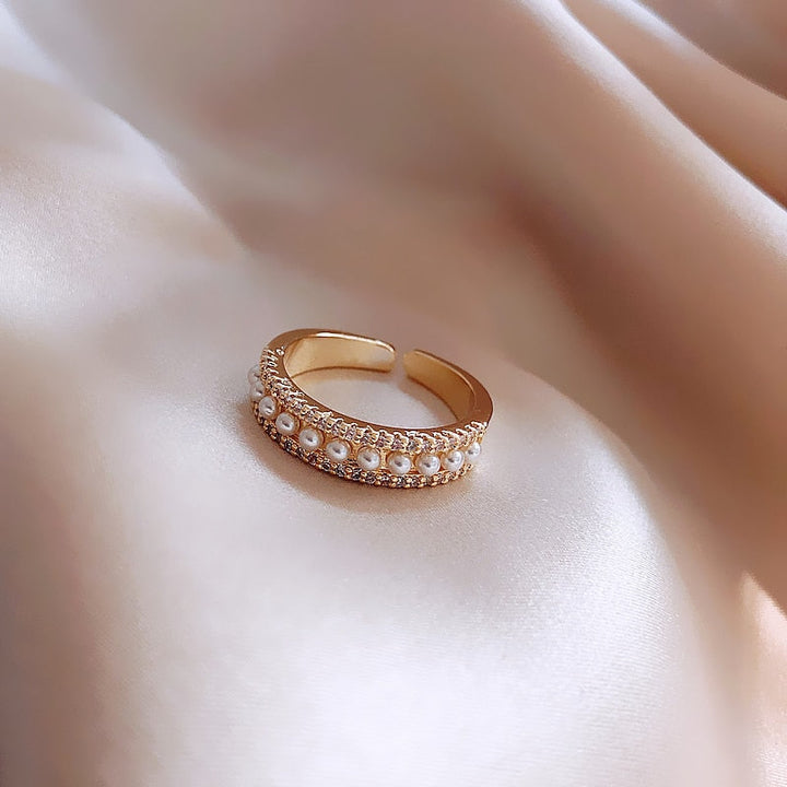 Lyxring med Pärlor och Guld