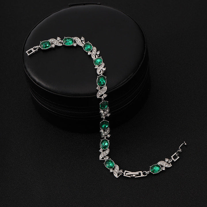 Silverarmband med gröna smaragder