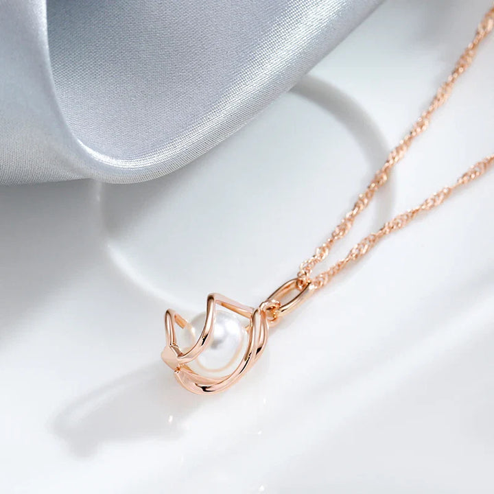 Exklusivt geometriskt pärlhalsband i roséguld