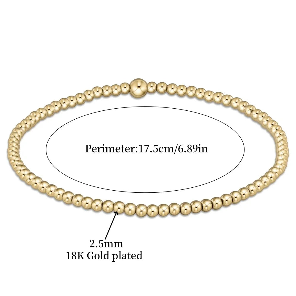 Elegant armband i 18 karat guld med turkosa pärlor