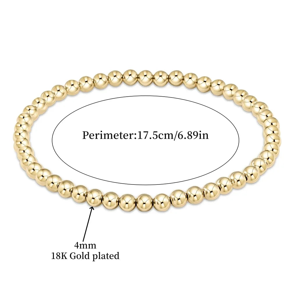 Elegant armband i 18 karat guld med turkosa pärlor