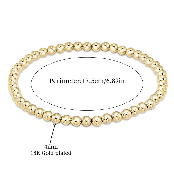 Elegant armband i 18 karat guld med turkosa pärlor