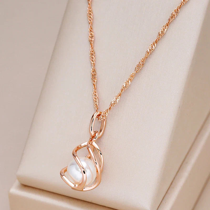 Exklusivt geometriskt pärlhalsband i roséguld