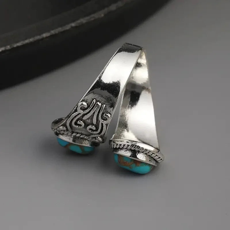 Elegant vintage turkos korsbandsring