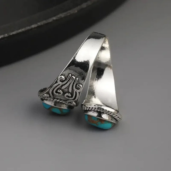 Elegant vintage turkos korsbandsring