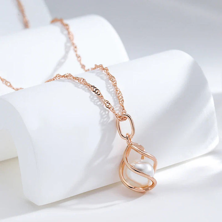 Exklusivt geometriskt pärlhalsband i roséguld