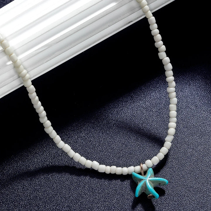 Elegant bohemiskt turkos sjöstjärnhalsband