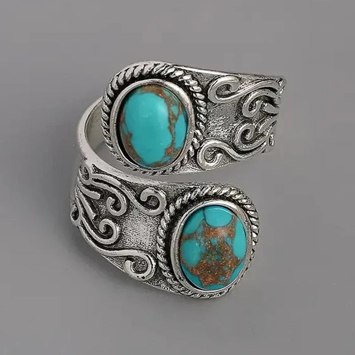Elegant vintage turkos korsbandsring