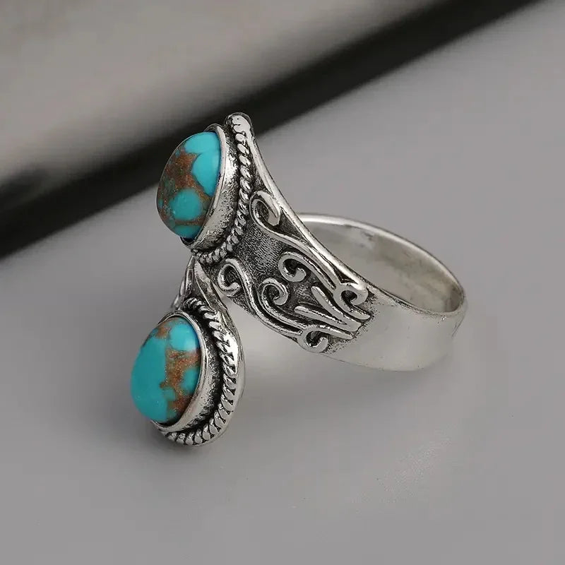 Elegant vintage turkos korsbandsring