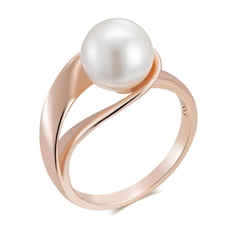 Exklusiv geometrisk ring i roséguld med pärlor