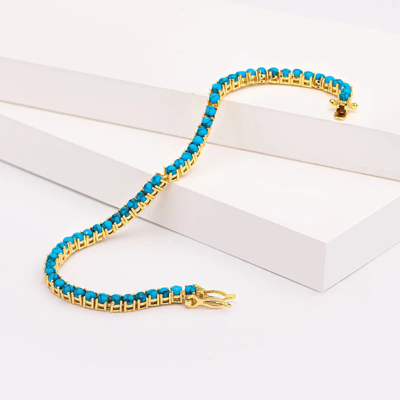 Elegant guldfärgad turkos kedjearmband
