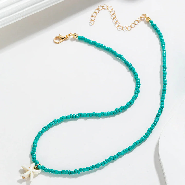 Elegant bohemiskt turkos sjöstjärnhalsband