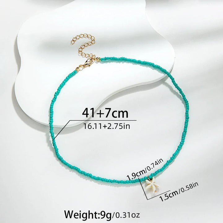 Elegant bohemiskt turkos sjöstjärnhalsband