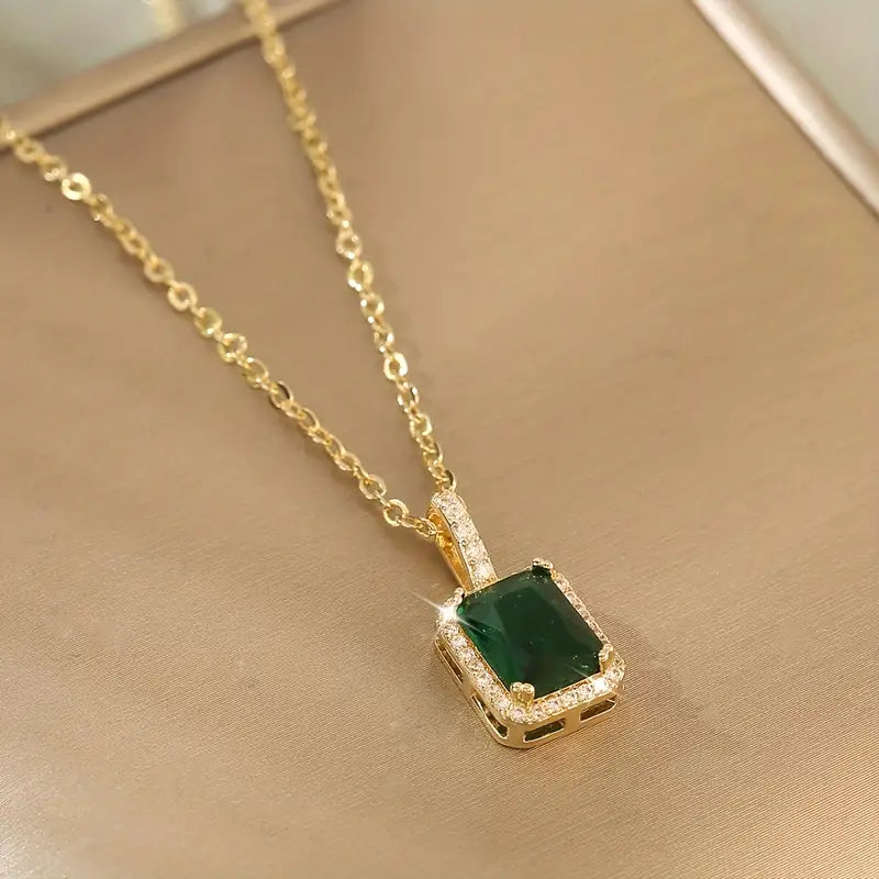 Halsband med ädelstenar i guld