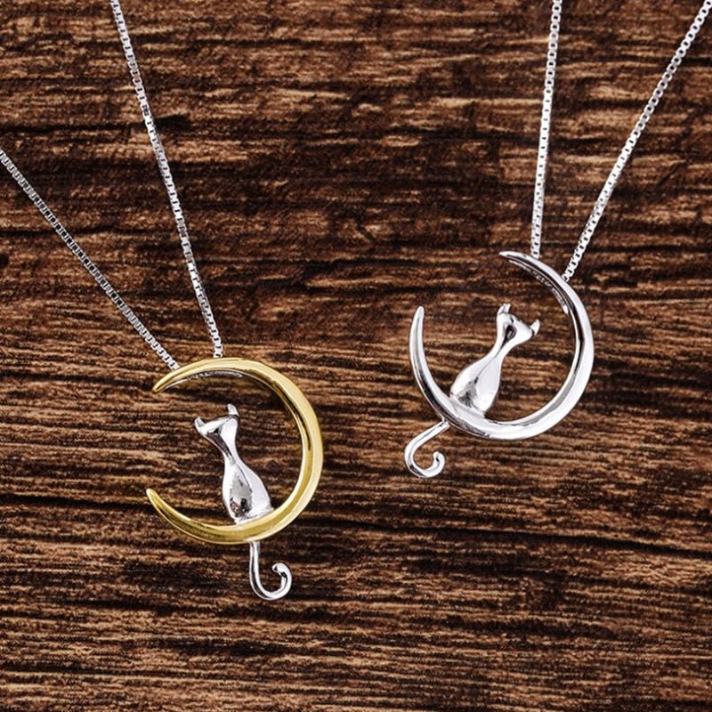 Stilfull katt-halsband med halvmåne och kattmotiv